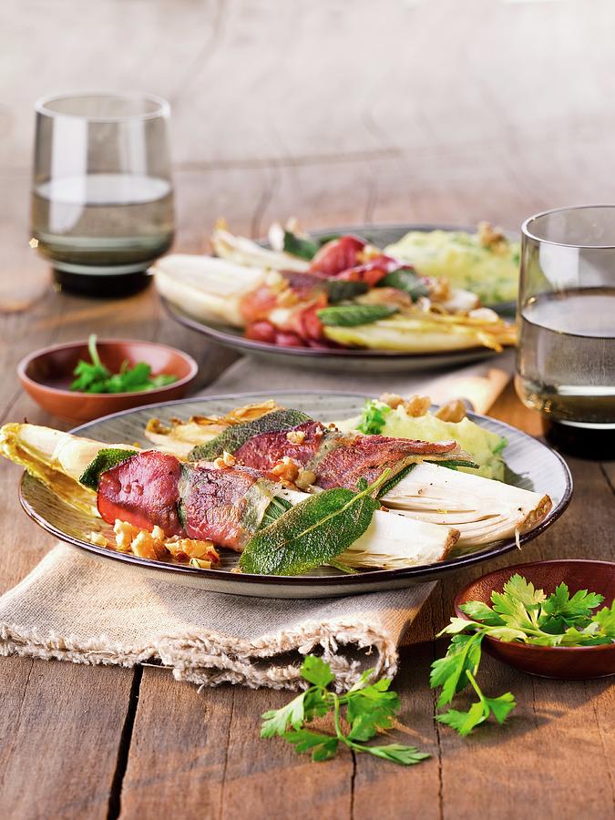 Chicory Saltimbocca With Raw Ham And Sage Photograph by Manfred Jahrei