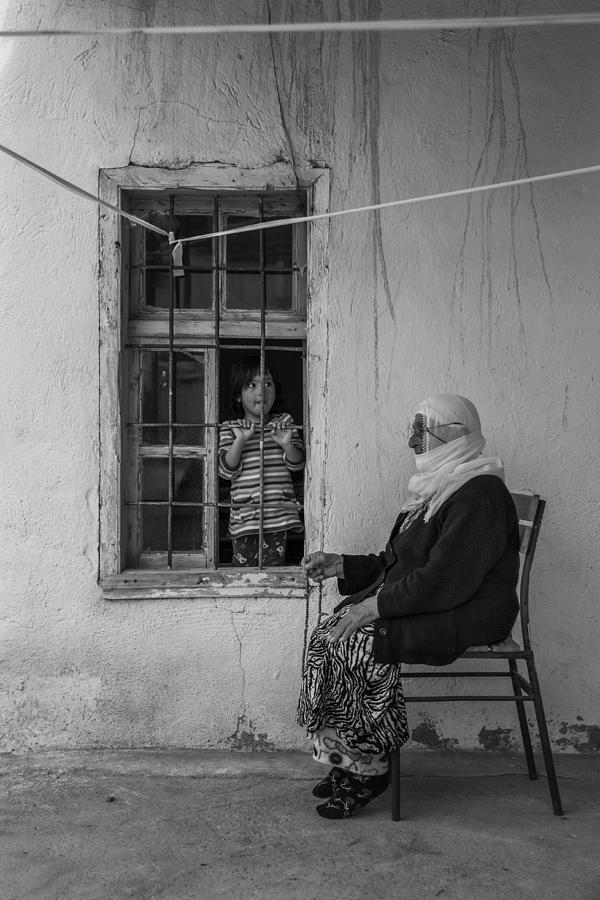 Child And Grandmother Photograph by Ferhat Gursu