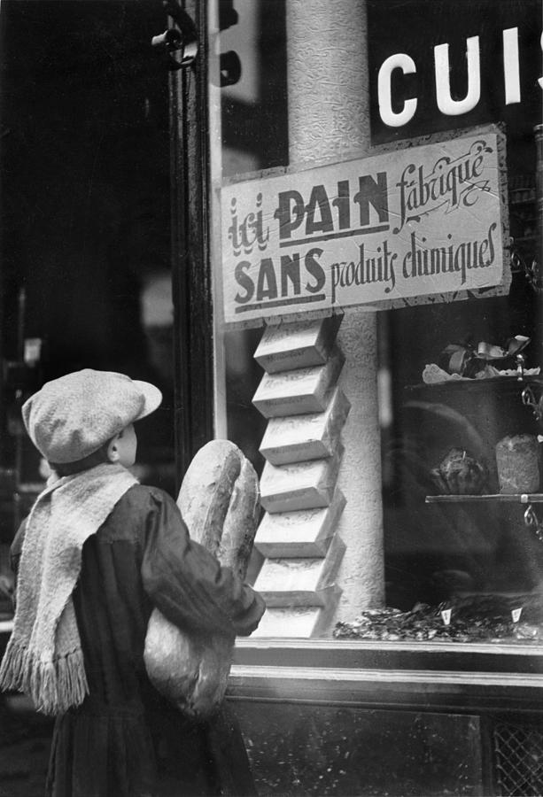 Child Carrying Bread 1920-1930 Photograph by Keystone-france