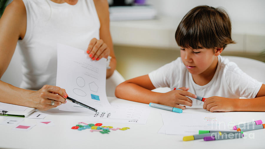 Child Colouring Shapes During Assessment Photograph by Microgen Images/science Photo Library