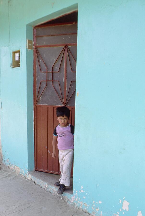 Child In Doorway Photograph by Jerome S. Siegel