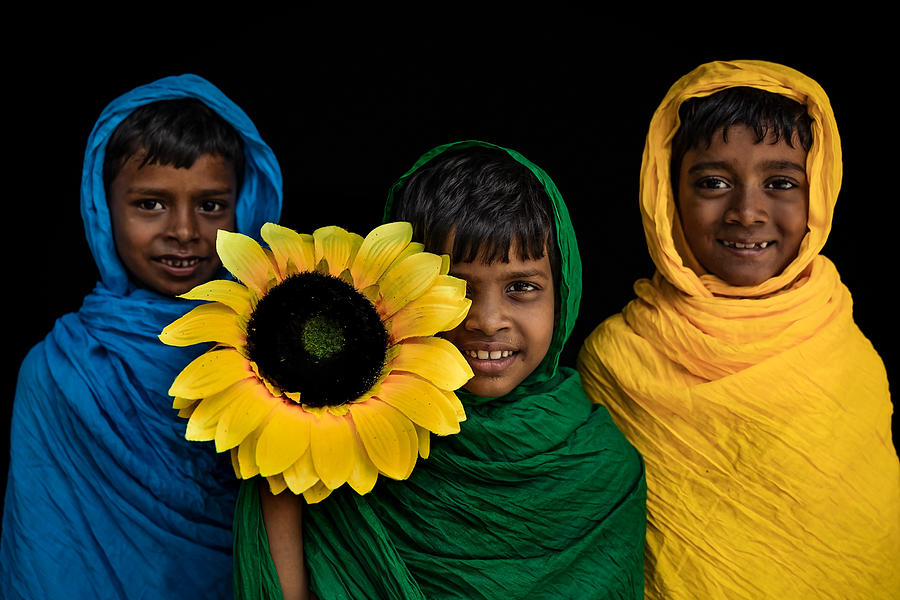 Child Portrait With Sunflower Photograph by Prithul Das
