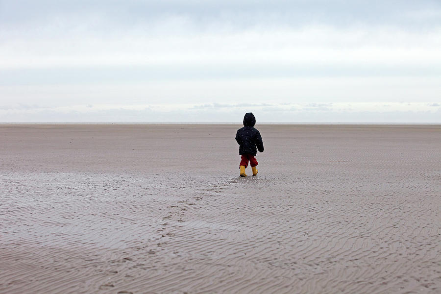 Child Walking Towards Sea On Beach Photograph by Koen Wolters Photography Huissen Nl