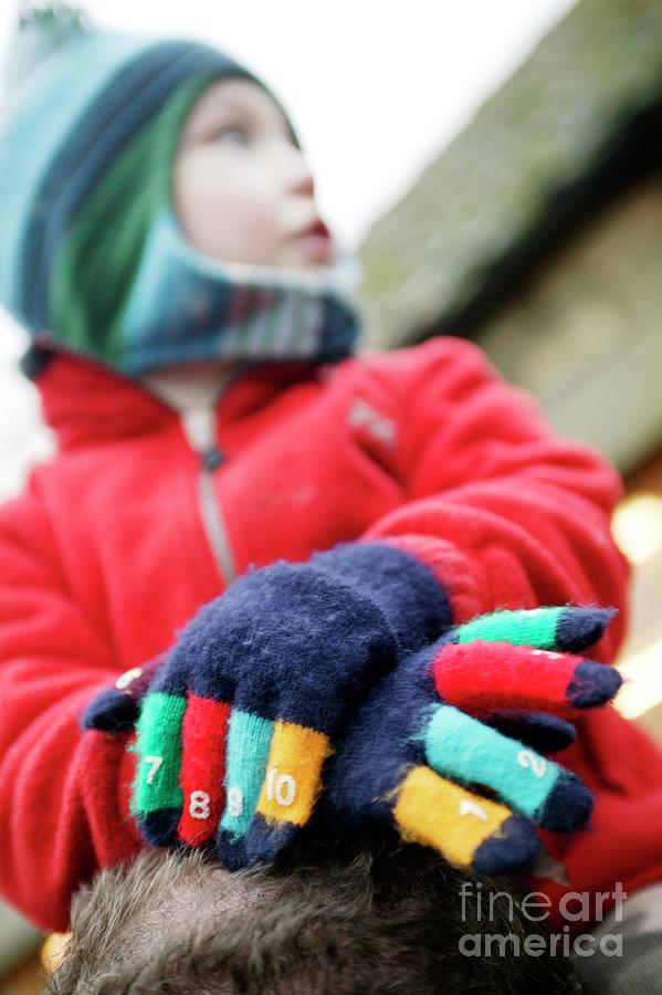 Child Wearing Gloves Photograph by Michael Donne/science Photo Library