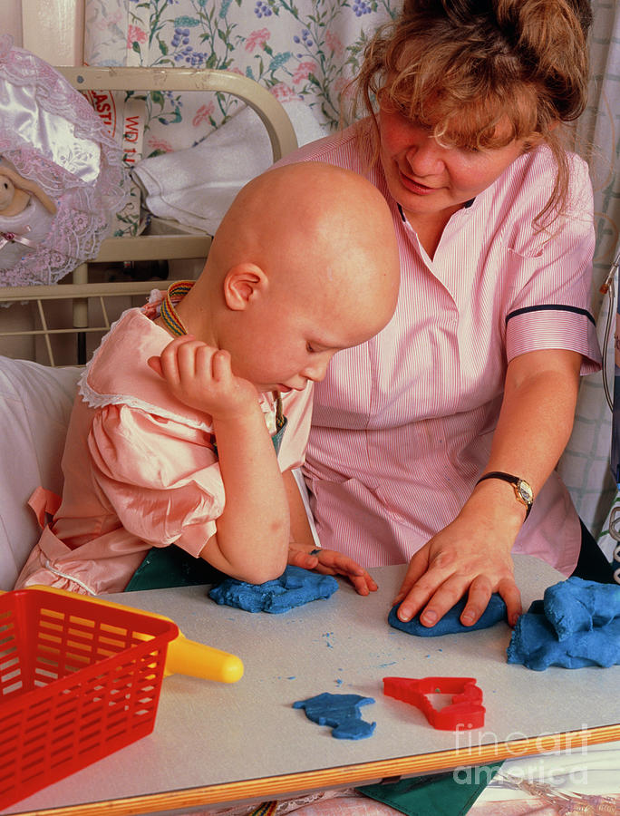 Child With Ewings Sarcoma In An Hospital Nursery Photograph by Simon Fraser/royal Victoria Infirmary/science Photo Library