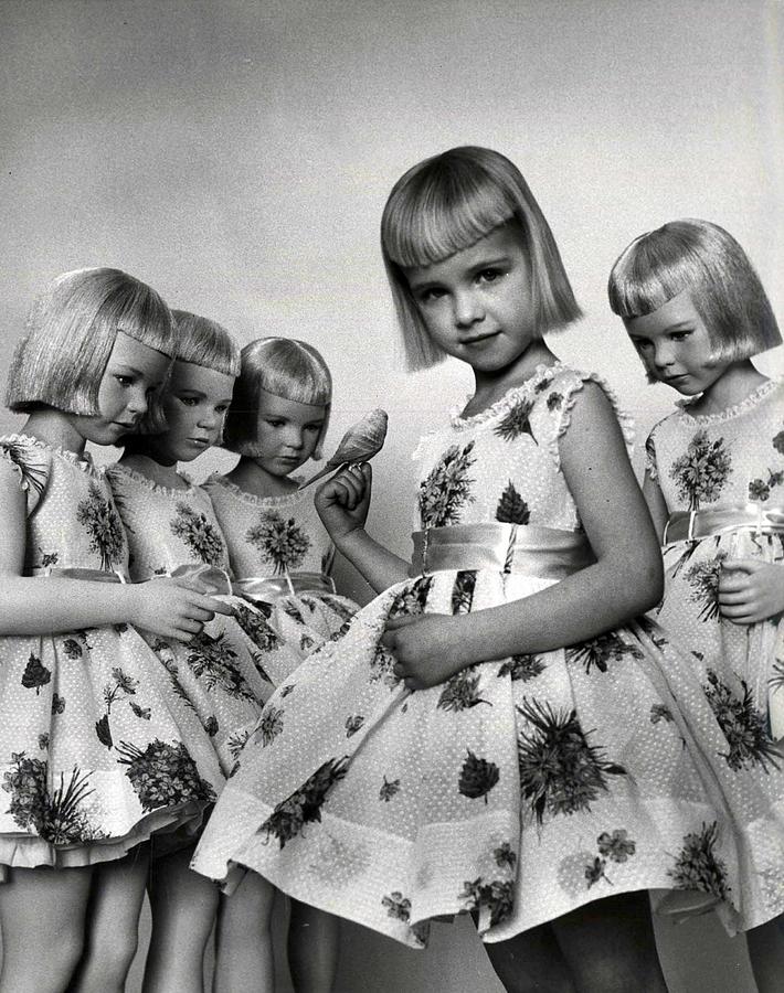 Child with Mannequins by Nina Leen