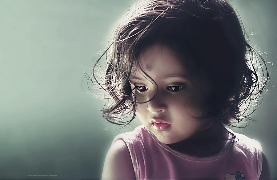 Portrait Photograph - Childhood Means Simplicity by Sanhita Bhattacharjee