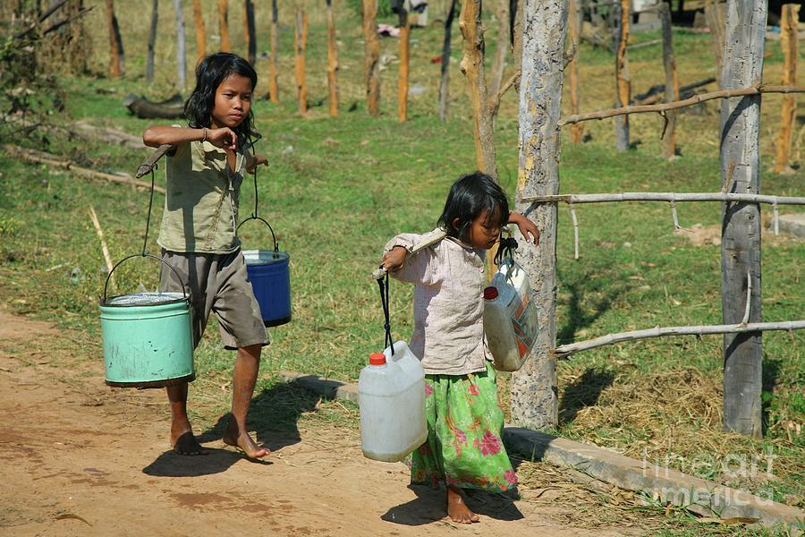 Children Carrying Water Photograph by Bjorn Svensson/science Photo Library
