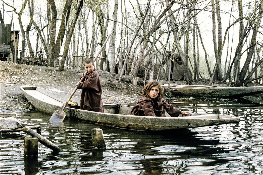 Children in Boat on Dal Lake, Kashmir by Pete Hendley Children in Boat on Dal Lake, Kashmir by Pete Hendley