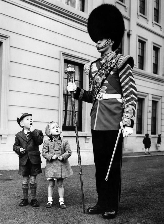 Children Looking At Horse Guard During Photograph by Keystone-france