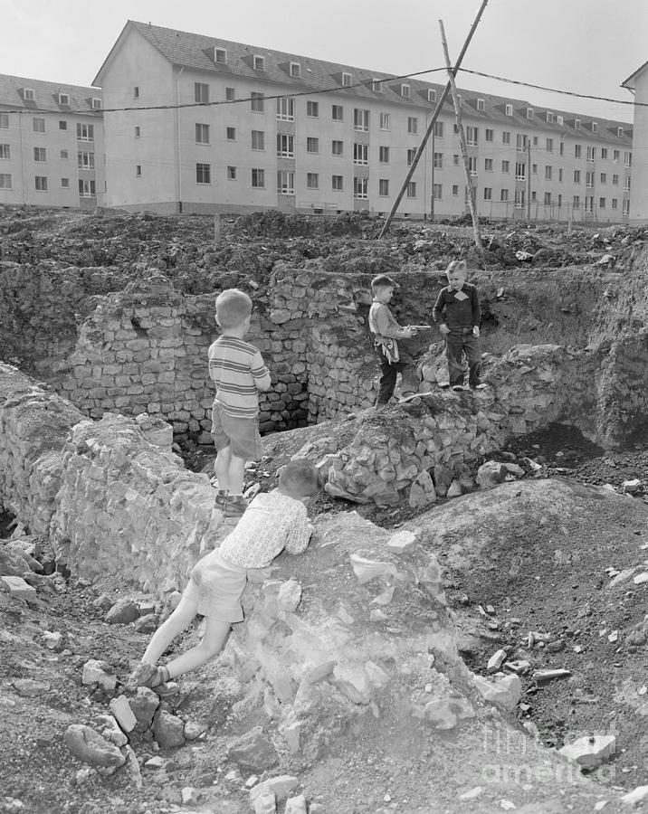 Children Playing In Ruins Photograph by Bettmann
