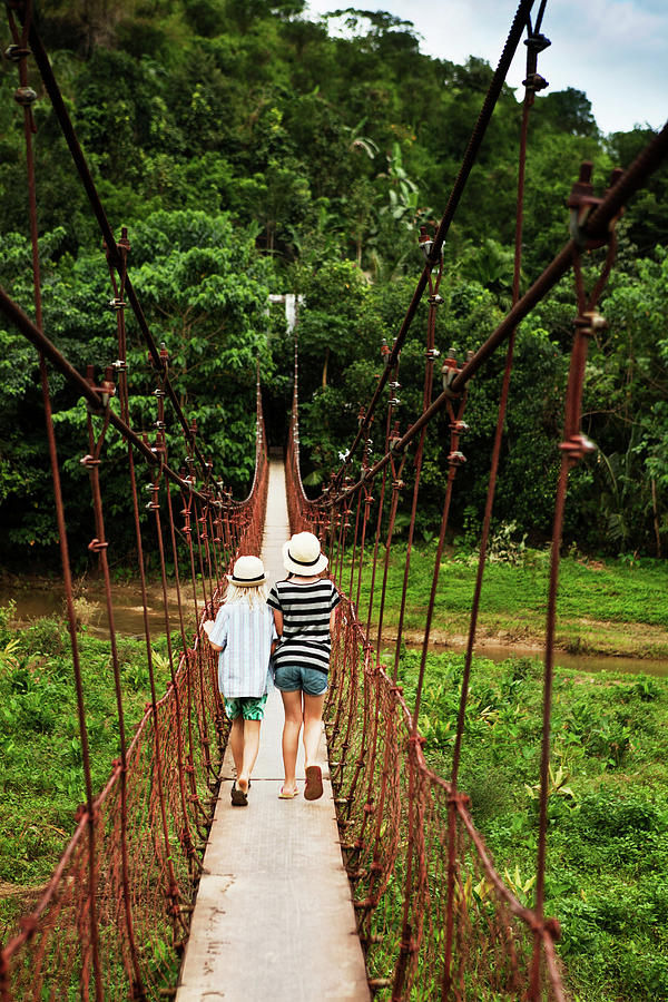 Children Walking On Rope Bridge Digital Art by Christoffer Askman