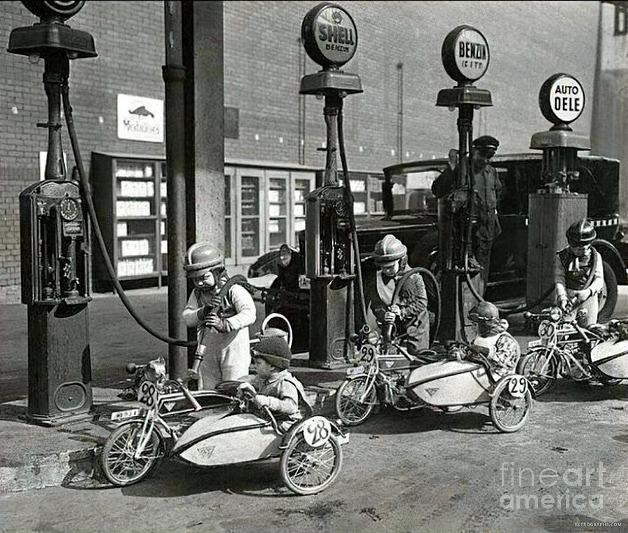 Children With 1920s Miniature Motorcycles And Sidecars At Gas Station Photograph by Retrographs