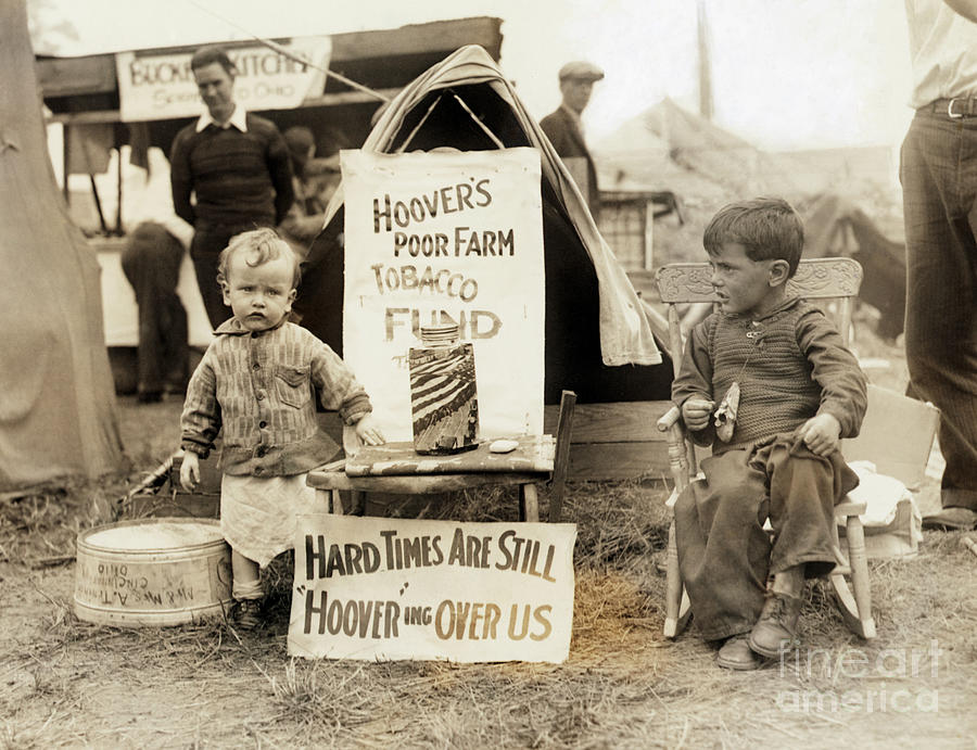 Children With Sign Dressed Poorly Photograph by Bettmann