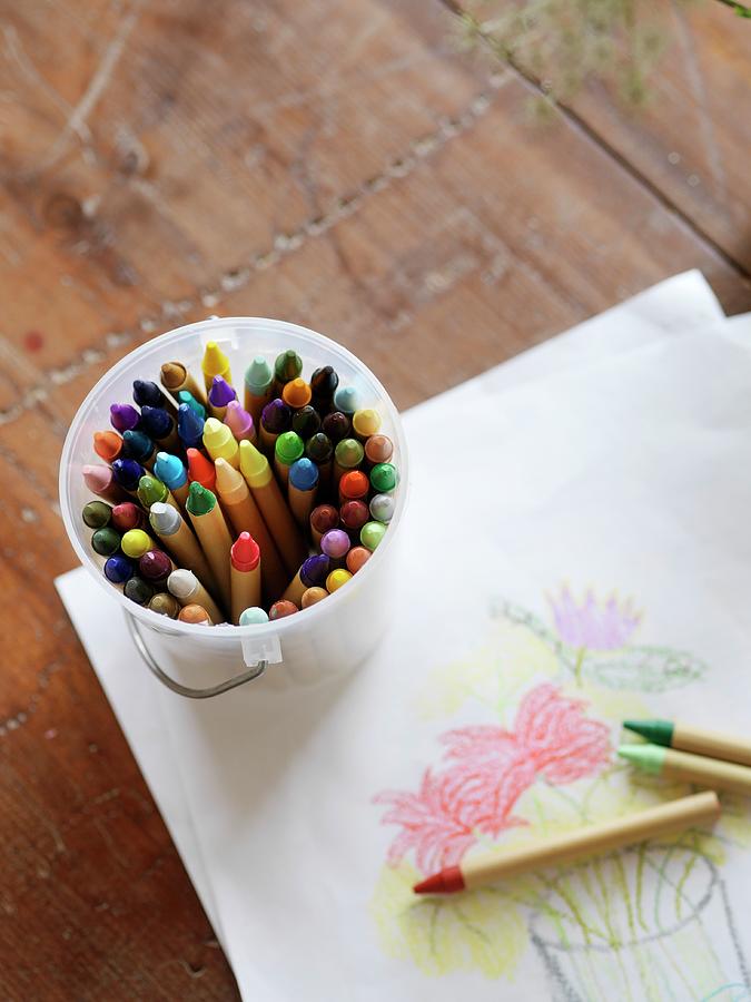 Crayon Photograph - Childs Drawing And Coloured Crayons by Yvonne Duivenvoorden
