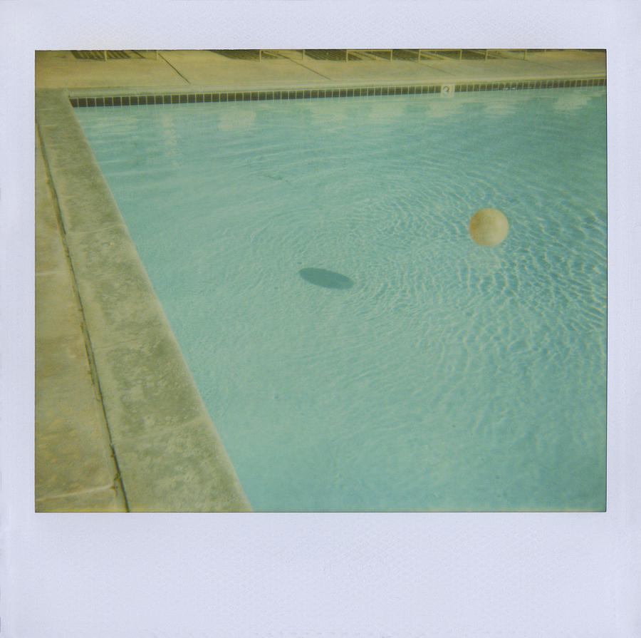 Childs Inflatable Ball Floating In Photograph by Jena Ardell Childs Inflatable Ball Floating In Photograph by Jena Ardell