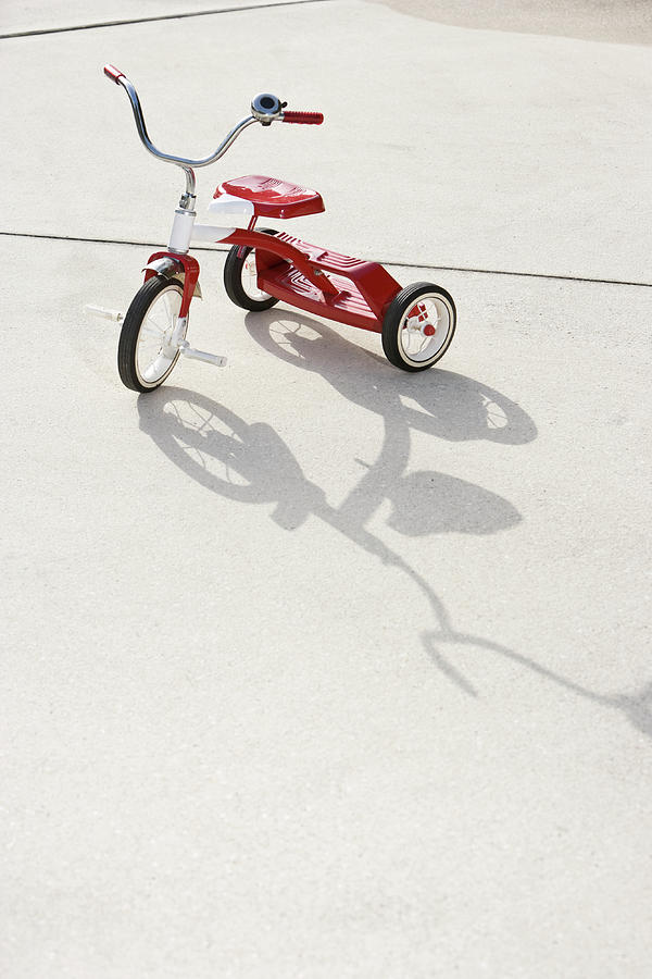 Childs Tricycle On Driveway Photograph by Kali9