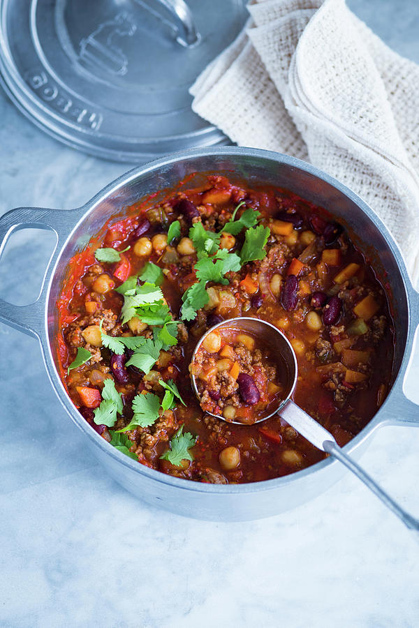 Chili Con Carne With Beans And Chickpeas In A Saucepan Photograph by Eising Studio