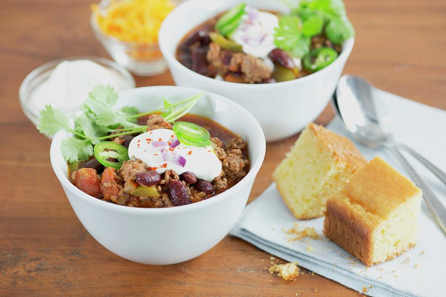Chilli Con Carne With Sour Cream And Corn Bread Photograph by Eising Studio - Food Photo & Video