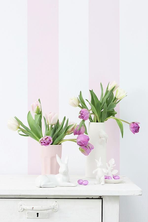 China Easter Bunnies And Vases Of Tulips In Front Of Striped Wallpaper Photograph by Thordis Rggeberg
