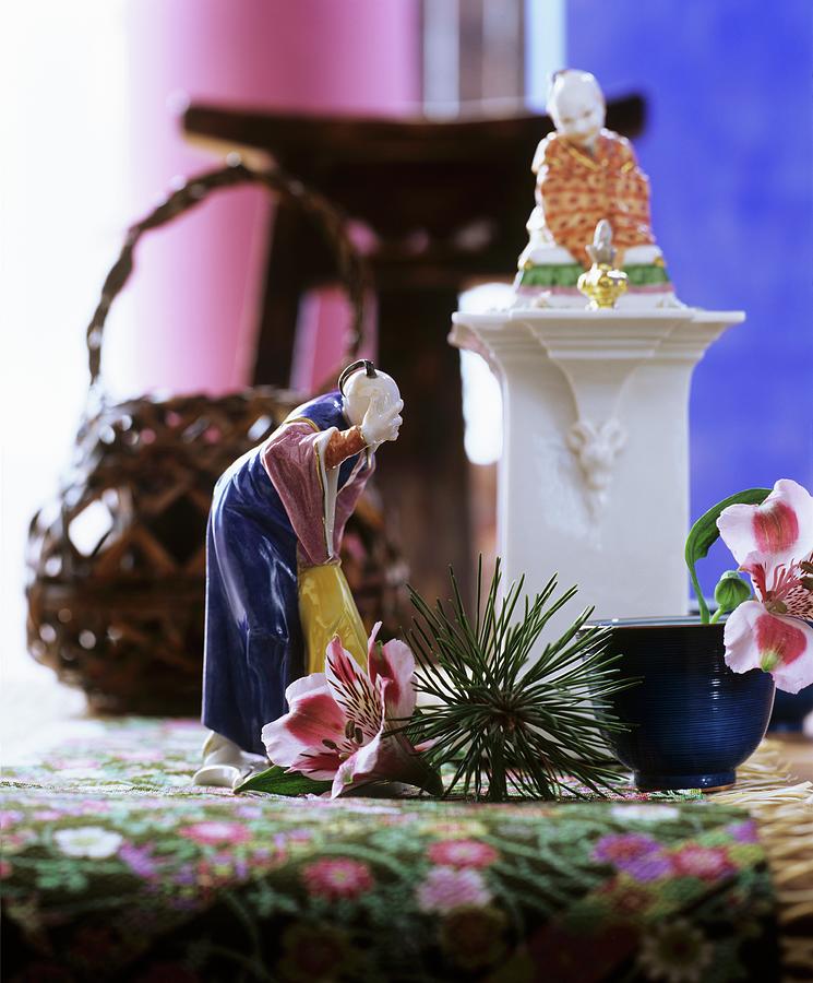 Lily Photograph - China Figurines, Pine Sprig And Peruvian Lilies by Matteo Manduzio