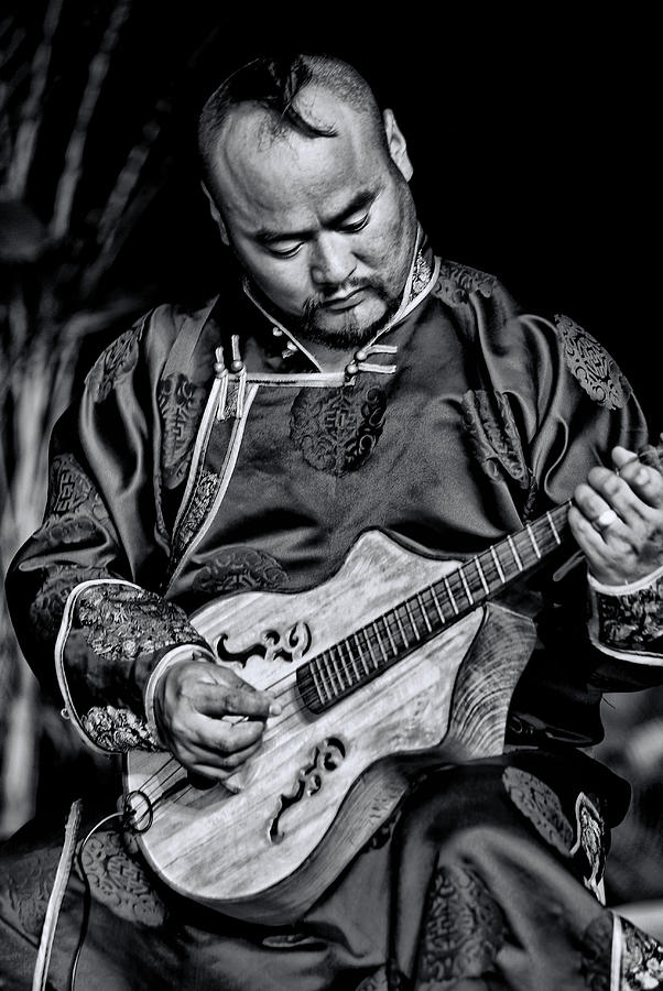Chinese musician Photograph by Bill Jonscher