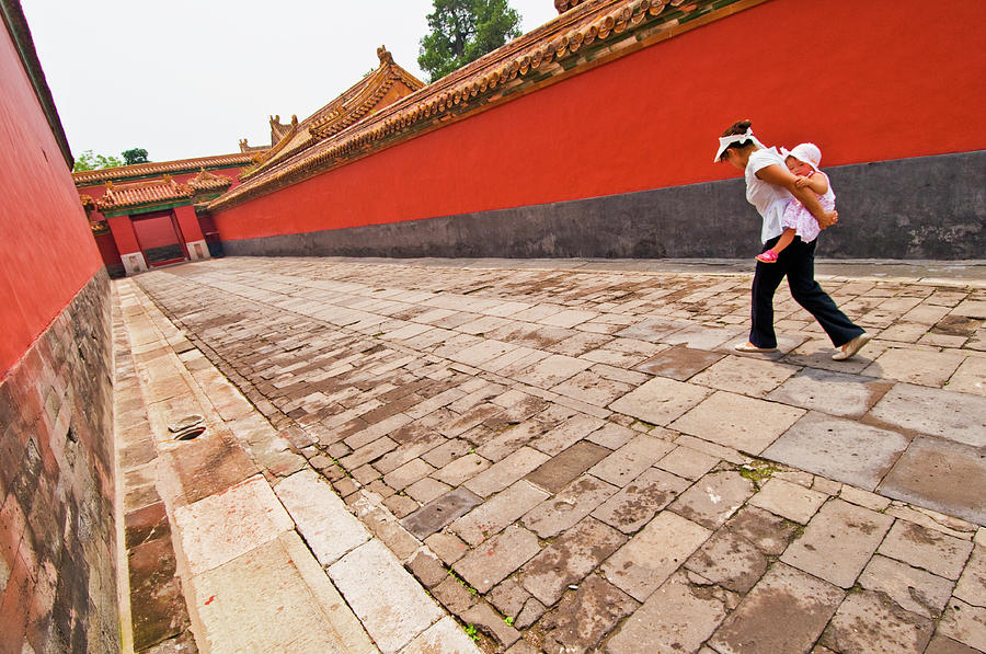 Chinese Tourist Woman Carrying Child Photograph by Tim Makins Chinese Tourist Woman Carrying Child Photograph by Tim Makins