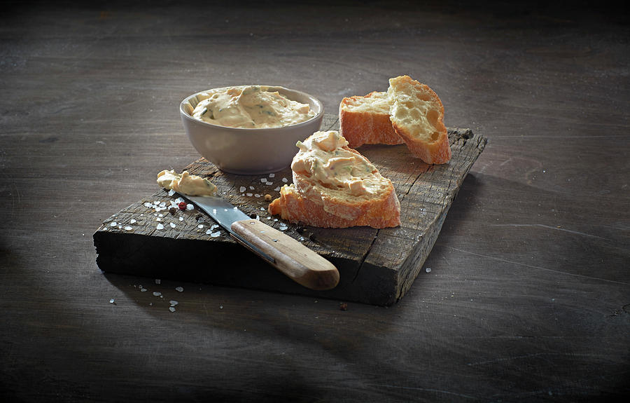 Chive Cream Cheese Cream In A Bowl And On Baguette Slices Photograph by Christoph Maria Hnting
