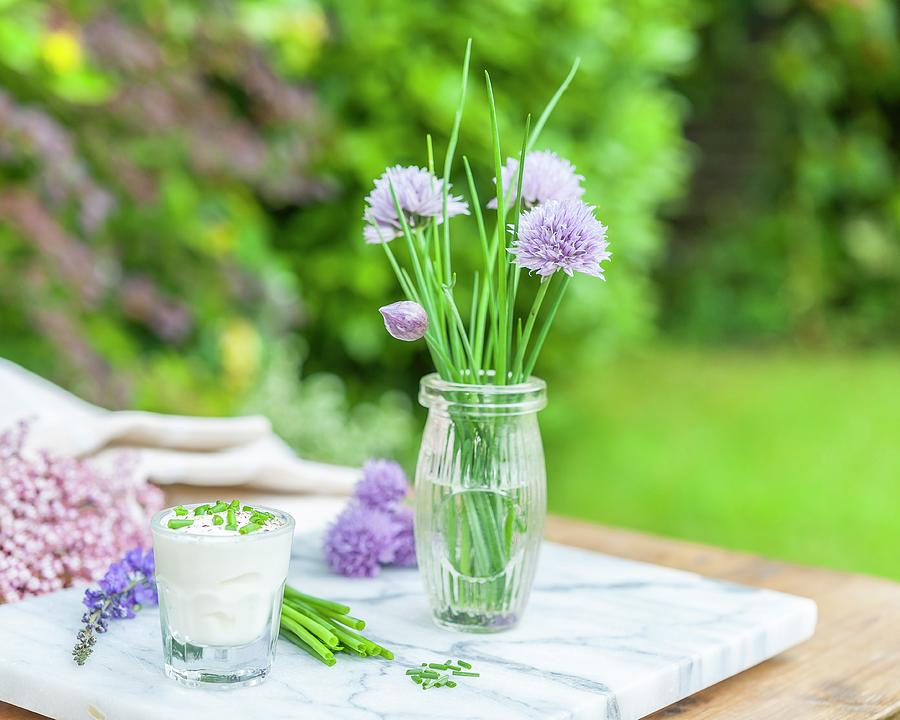 Chives And Chive Quark On A Garden Table Photograph by The Studio Collection