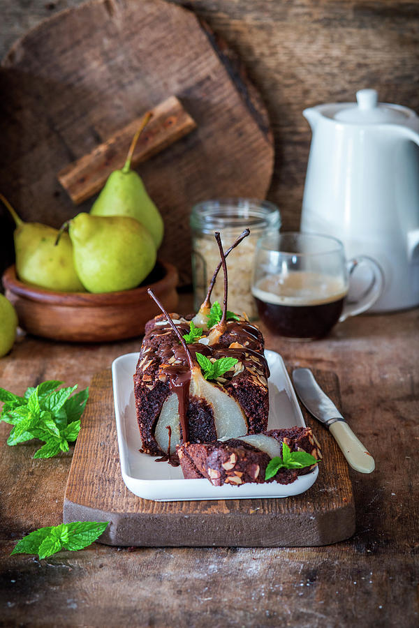Chocolate Almond Cake With Whole Poached Pears Photograph by Irina Meliukh