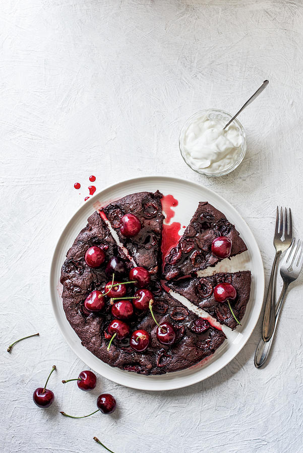 Chocolate, Amaretto And Cherry Brownie With Cream And Fresh Cherries Photograph by Magdalena Hendey