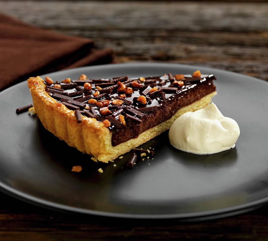 Chocolate And Almond Tart With Cream Photograph by Robert Morris