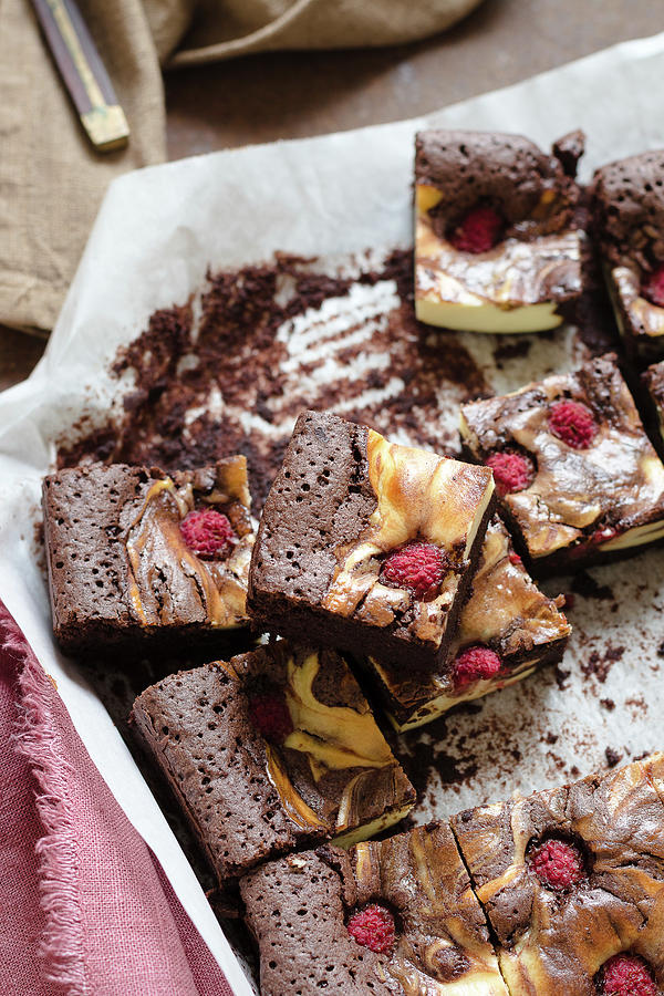 Chocolate And Cheesecake Brownies With Raspberries Photograph by Alice Del Re