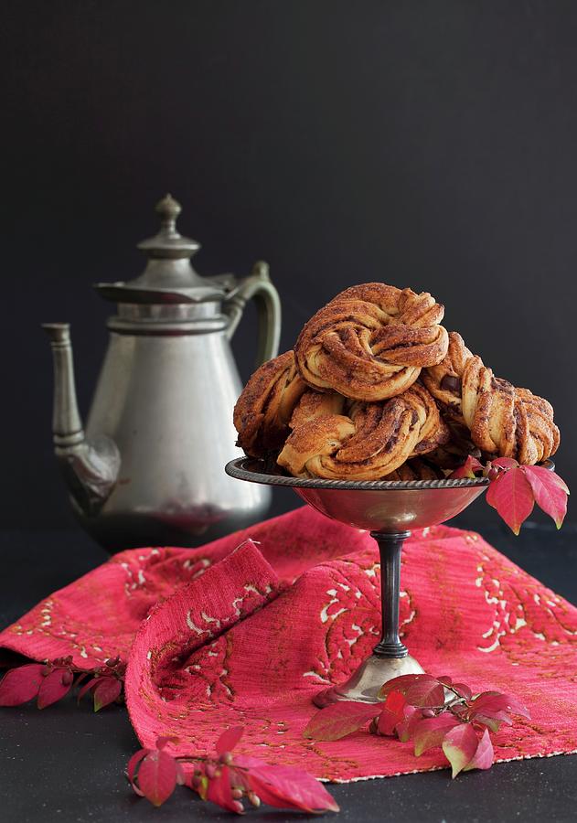 Chocolate And Cinnamon Buns On A Pewter Stand Photograph by Yelena Strokin