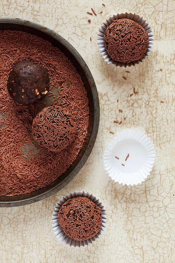 Chocolate And Nut Truffles With Chocolate Sprinkles Photograph by Jane Saunders