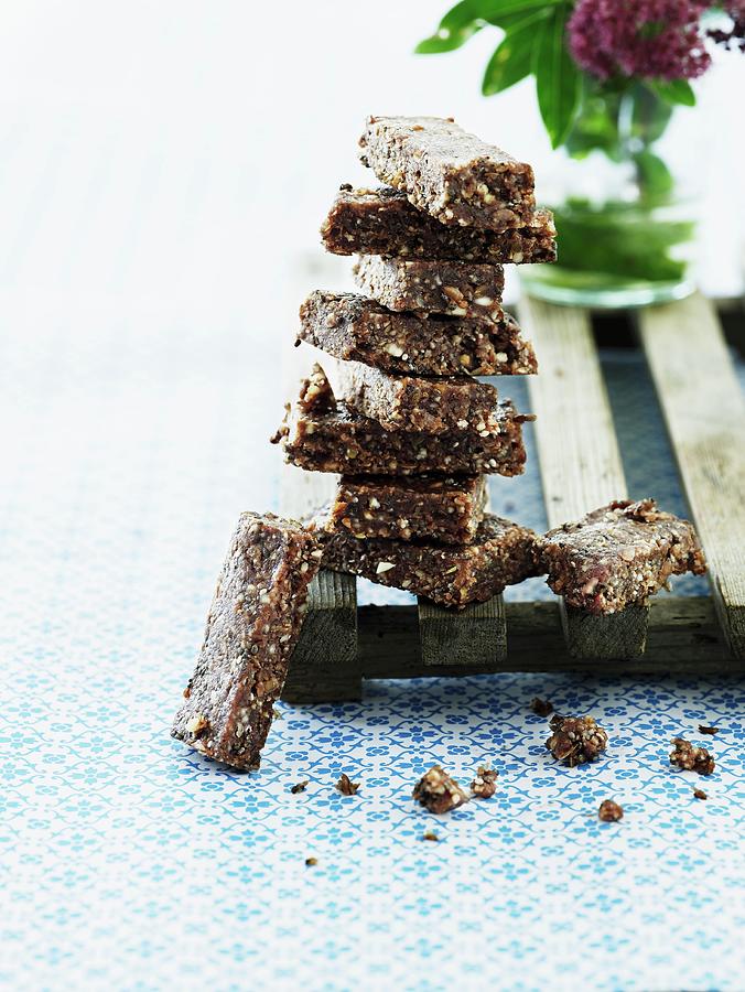Chocolate And Nuts Slices Photograph by Mikkel Adsbl