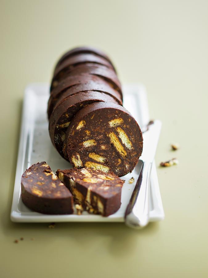 Chocolate And Rich Tea Biscuit Sausage Photograph by Roulier-turiot