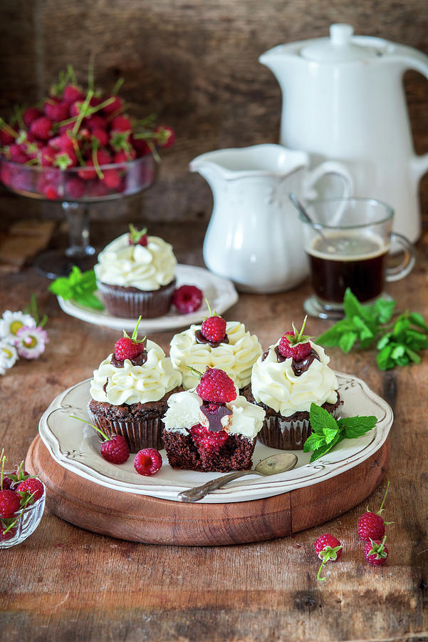 Chocolate And Vanilla Buttercream Cupcakes With Raspberry Photograph by Irina Meliukh