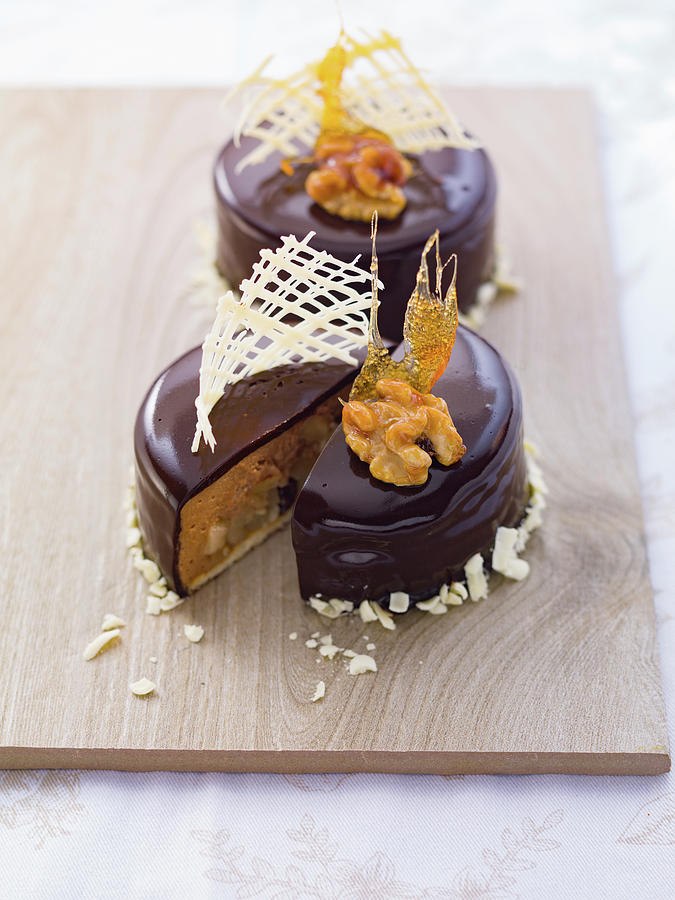 Chocolate And Walnut Cake With Caramel Shards Photograph by Eising Studio