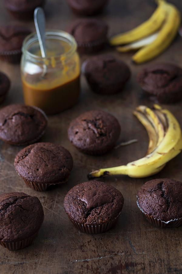 Chocolate Banana Muffins With Caramel Sauce Photograph by Malgorzata Laniak