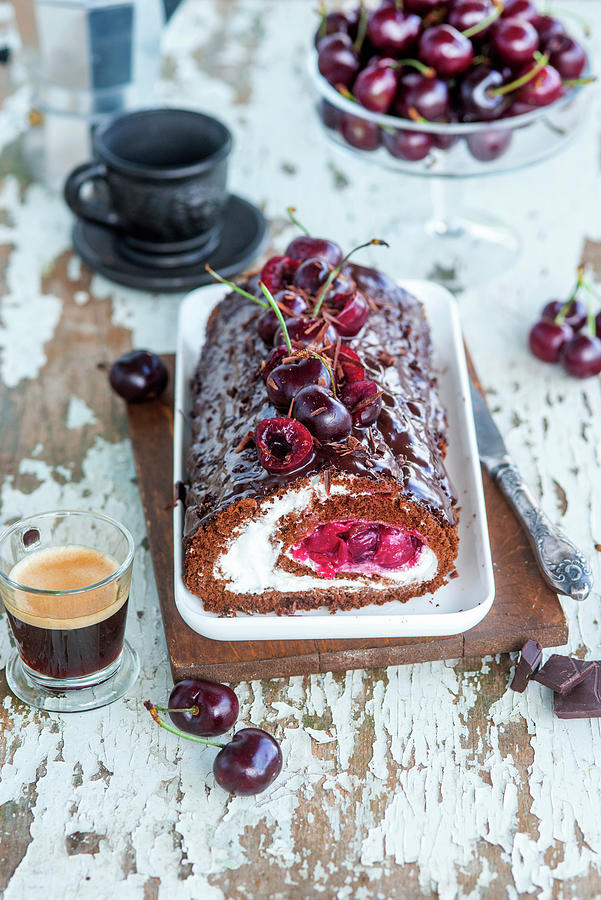 Chocolate Biscuit Roll With Mascarpone Cream And Cherries Photograph by Irina Meliukh