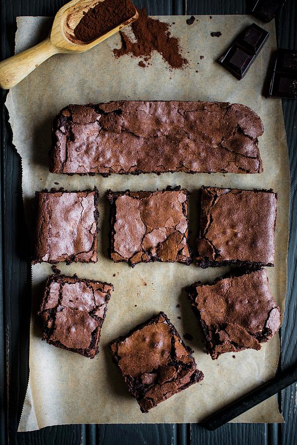 Chocolate Brownies On Baking Paper Photograph by Magdalena Hendey