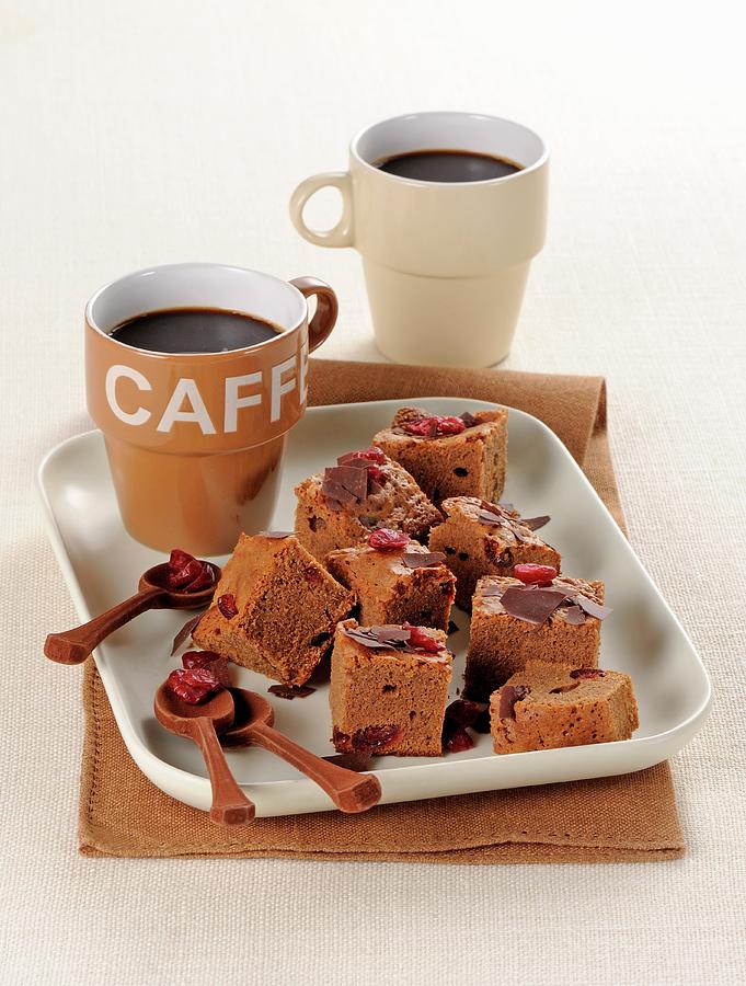 Chocolate Brownies With Dried Cranberries Served With Coffee Photograph by Franco Pizzochero