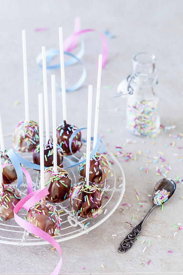 Chocolate Cake Pops Decorated With Sprinkles Photograph by Kati Finell
