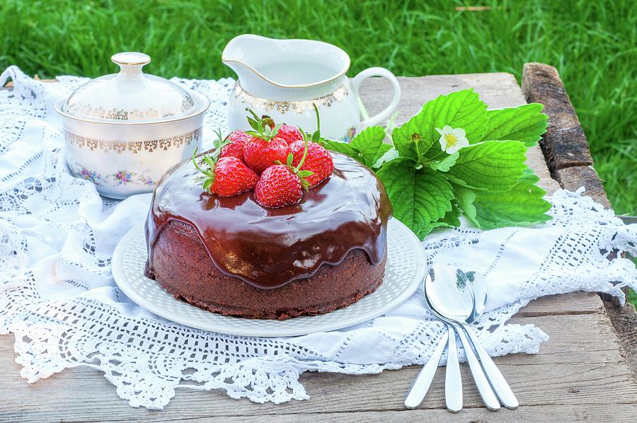 Chocolate Cake Topped With Strawberries Photograph by Irina Meliukh