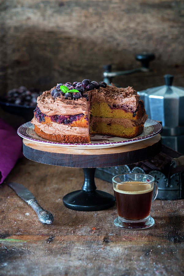 Chocolate Cake With Blackcurrants Photograph by Irina Meliukh