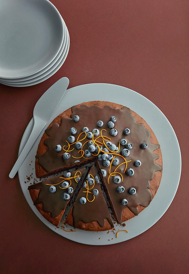 Chocolate Cake With Blueberries And Orange Zest Photograph by Frank Gllner