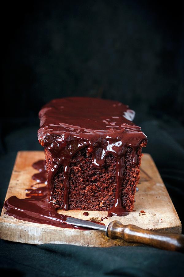 Chocolate Cake With Cranberry Jam And Chocolate Glaze Photograph by Irina Meliukh