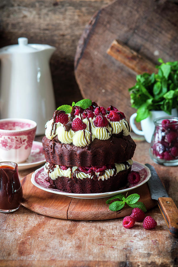 Chocolate Cake With Cream Cheese And Raspberries Photograph by Irina Meliukh