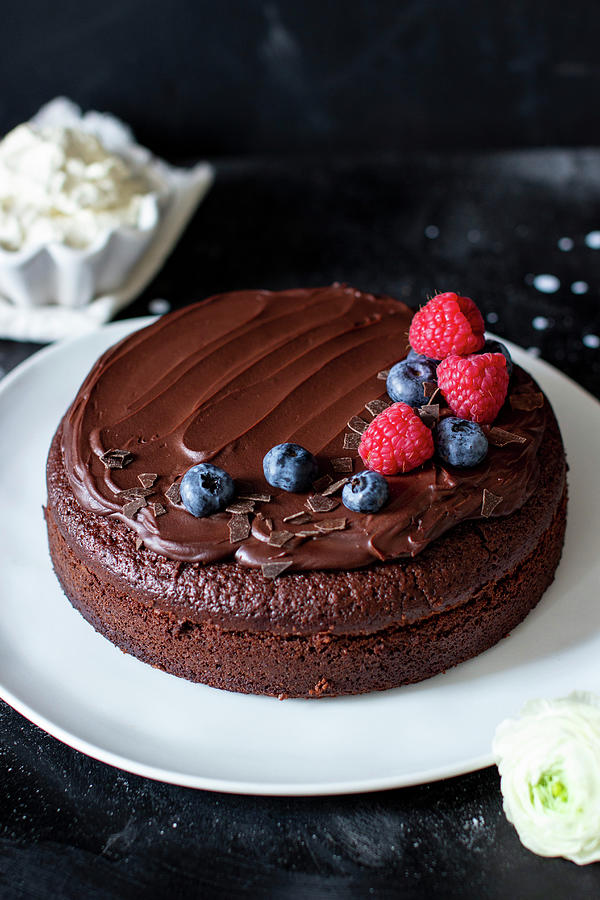 Chocolate Cake With Ganache And Fresh Berries Photograph by Annalena Bokmeier